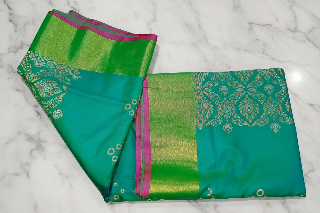 Kanchipuram Pure Silk Saree with mini buttas and two toned Gold border in Aqua Green color