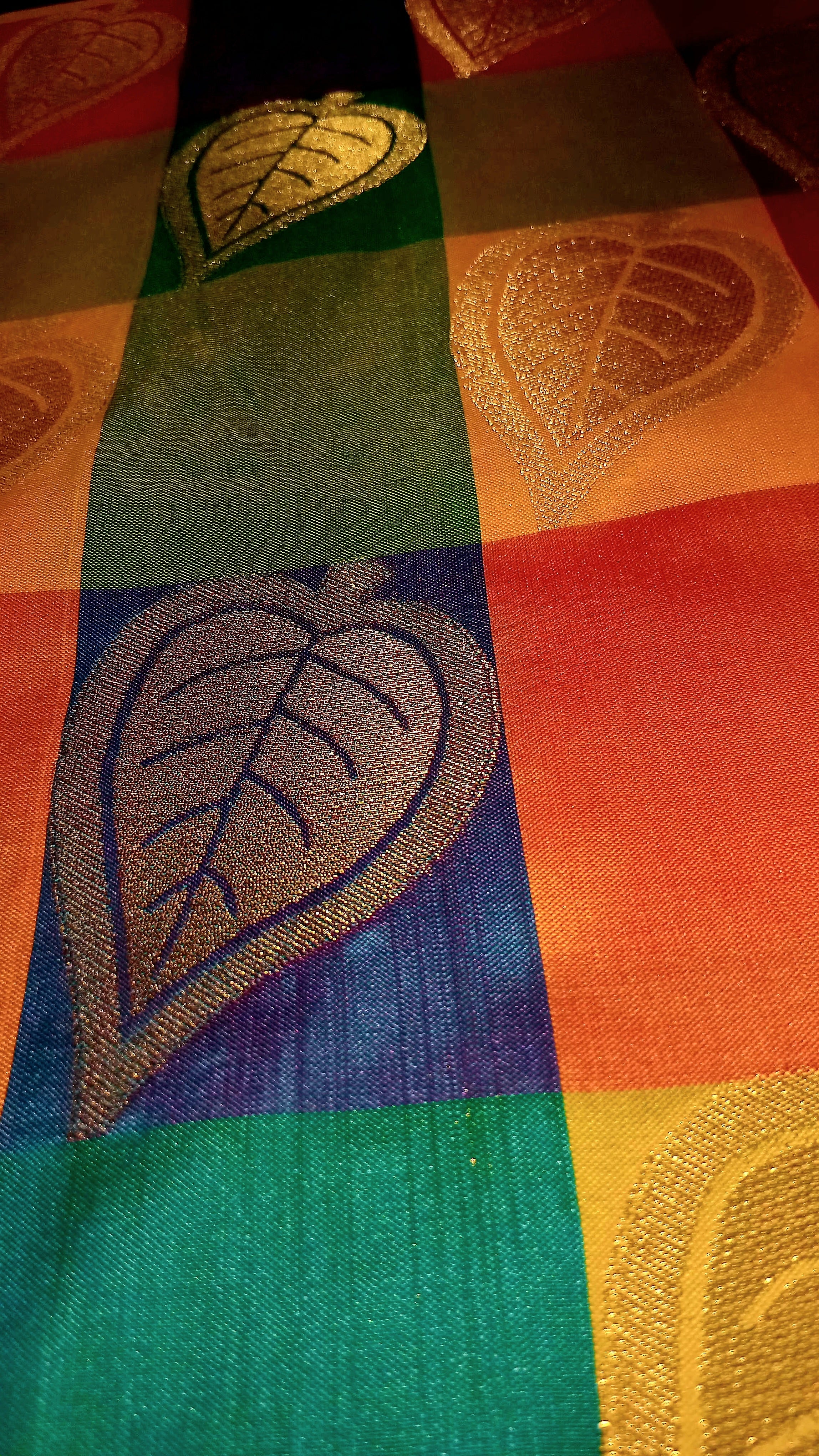 Kanchipuram Pure Silk Saree with Checkered Leaf Butta motifs and luxurious Pallu in Multi Yellow Orange color