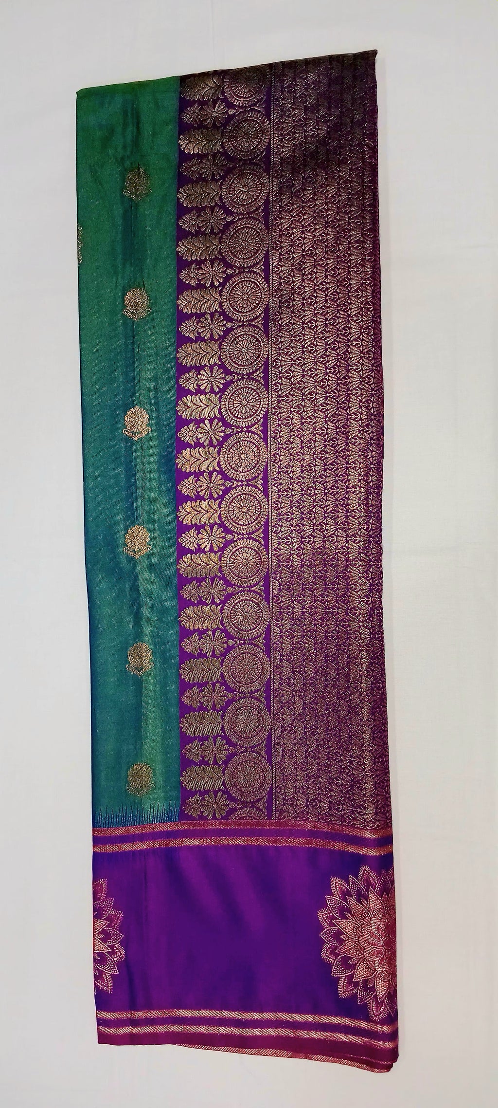 Kanchipuram Pure Silk Saree with Floral Butta in two tone Zari in Greenish Blue color with contrast Border