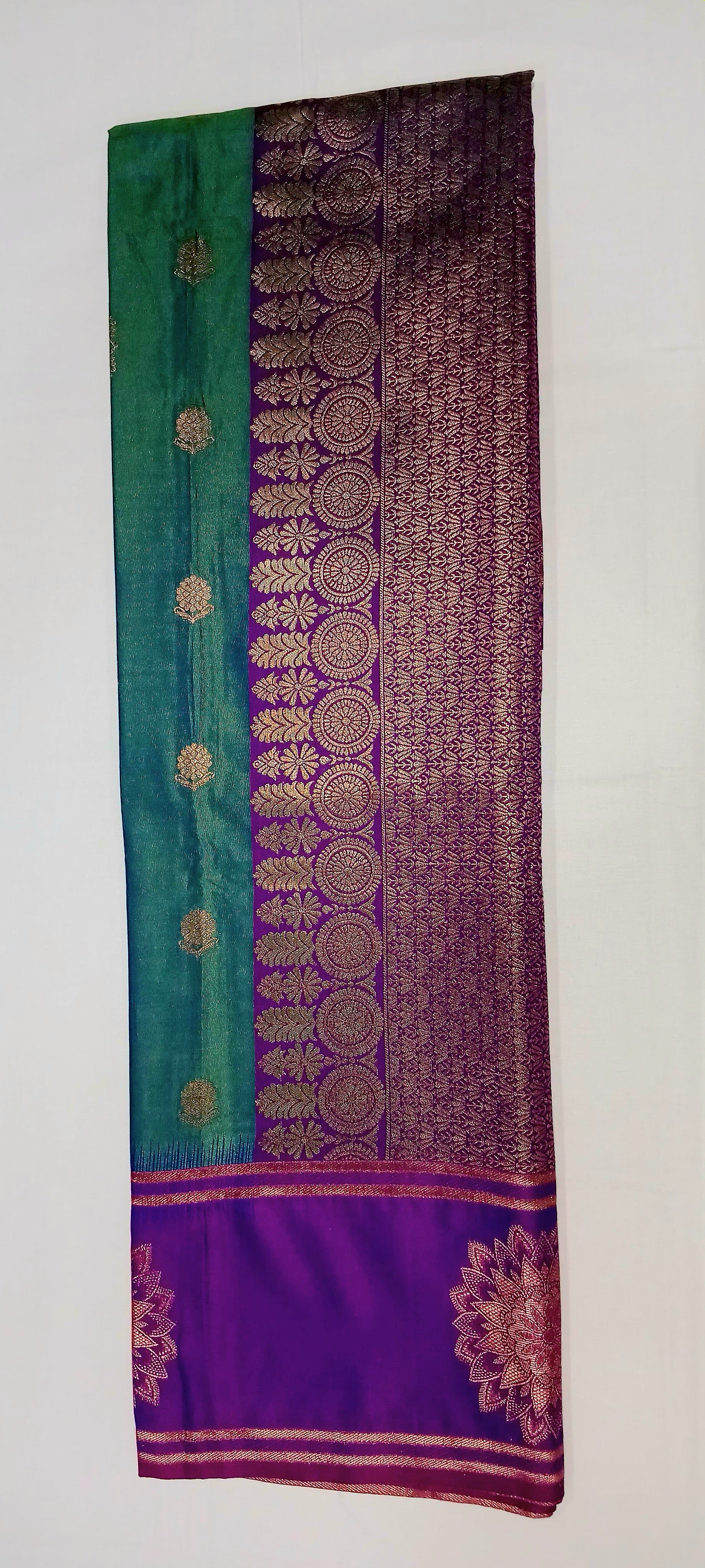 Kanchipuram Pure Silk Saree with Floral Butta in two tone Zari in Greenish Blue color with contrast Border