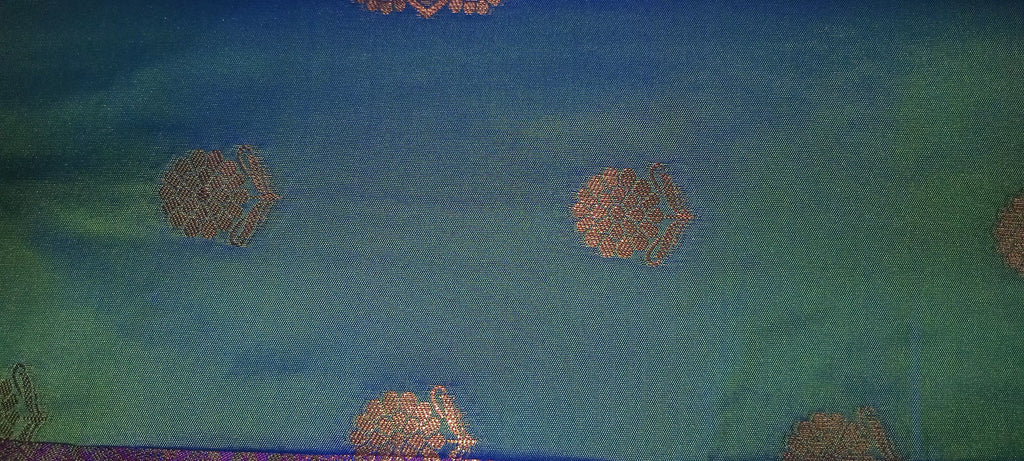 Kanchipuram Pure Silk Saree with Floral Butta in two tone Zari in Greenish Blue color with contrast Border