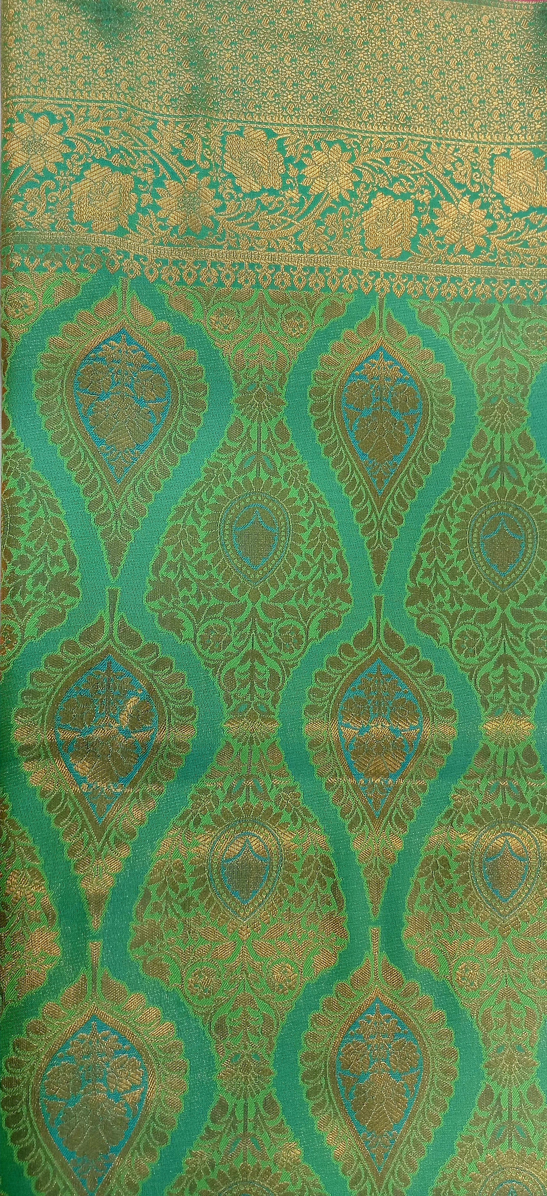 Kanchipuram Pure Silk Saree with detailed Butta motifs and luxurious Pallu in Fresh Green color