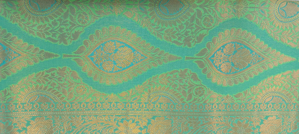 Kanchipuram Pure Silk Saree with detailed Butta motifs and luxurious Pallu in Fresh Green color