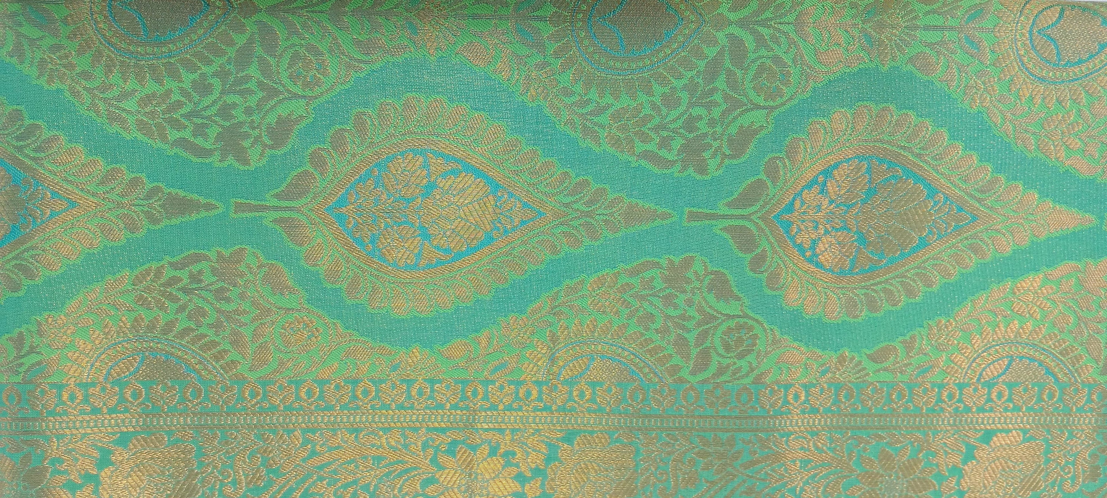 Kanchipuram Pure Silk Saree with detailed Butta motifs and luxurious Pallu in Fresh Green color
