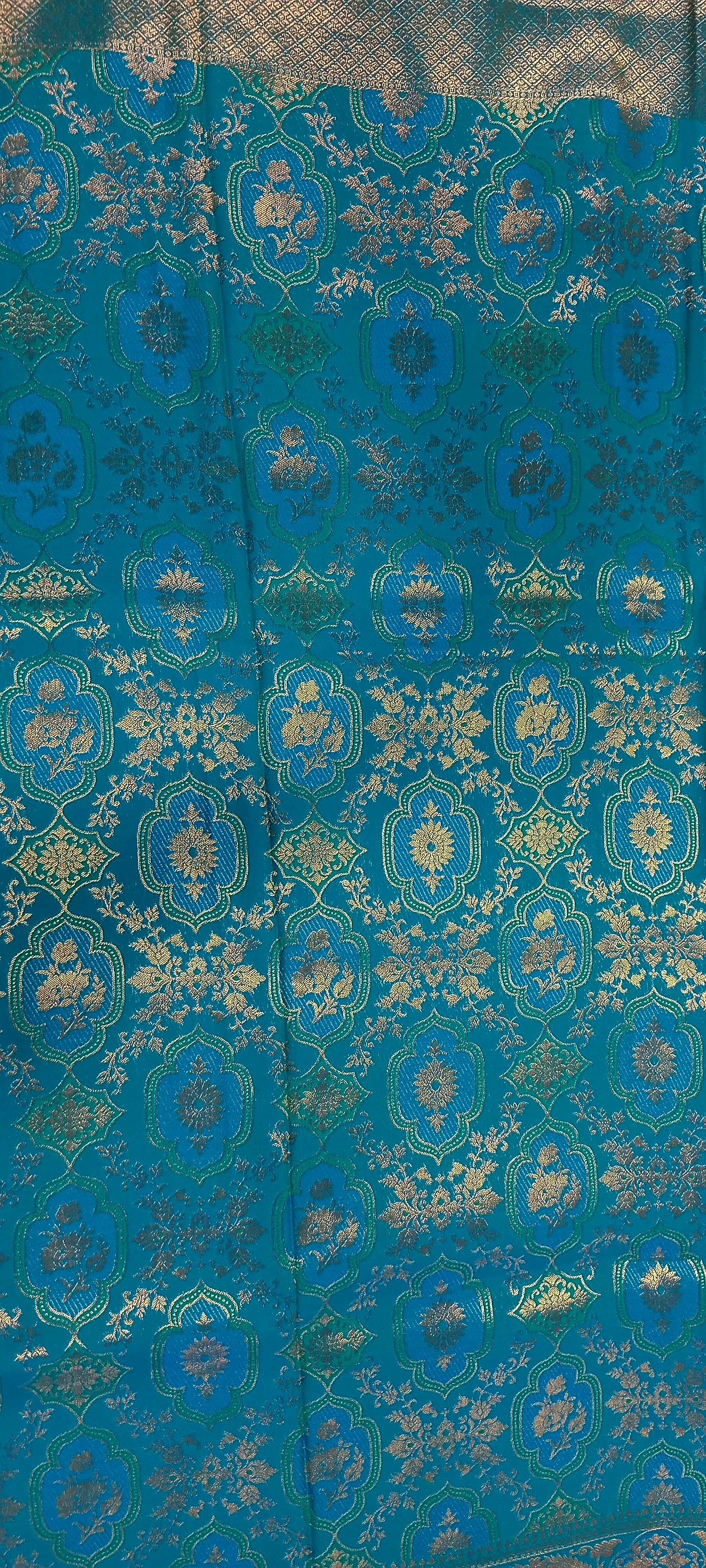 Kanchipuram Pure Silk Saree with detailed Butta motifs and luxurious Pallu in Aqua Blue color