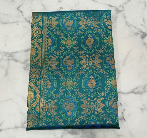 Detailed zari buttas detail on aqua blue Kanchipuram silk saree