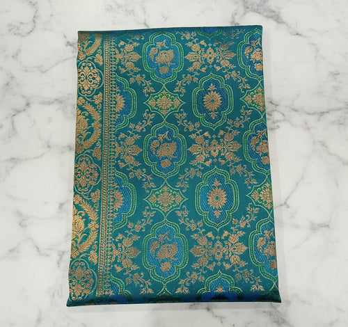 Detailed zari buttas detail on blue green Kanchipuram silk saree