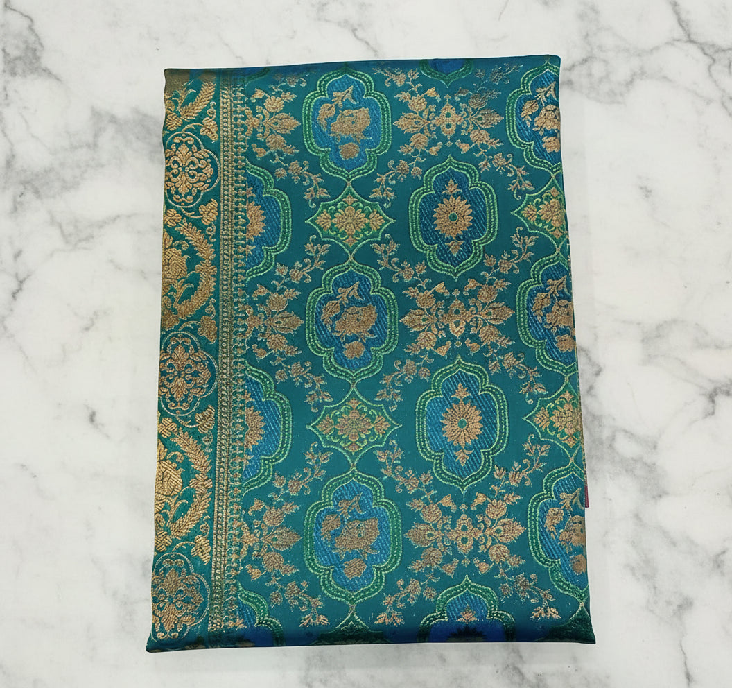 Kanchipuram Pure Silk Saree with detailed Butta motifs and luxurious Pallu in Blue Green color
