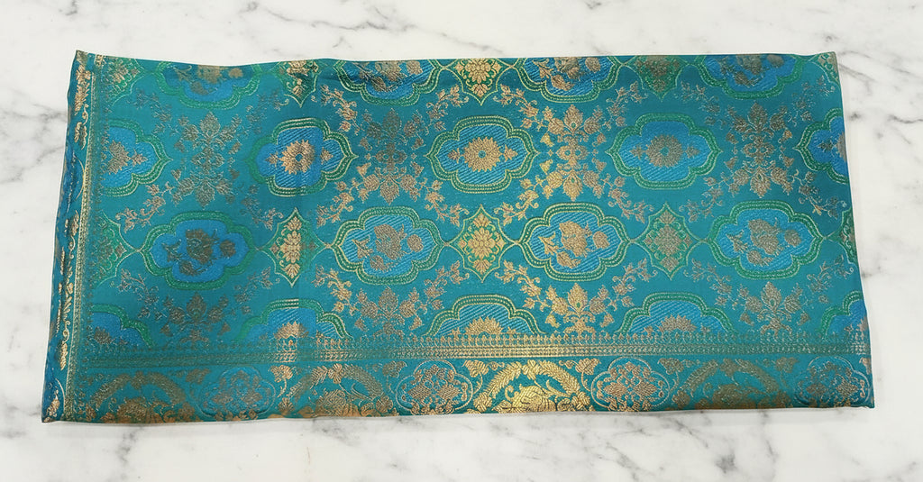 Kanchipuram Pure Silk Saree with detailed Butta motifs and luxurious Pallu in Aqua Blue color