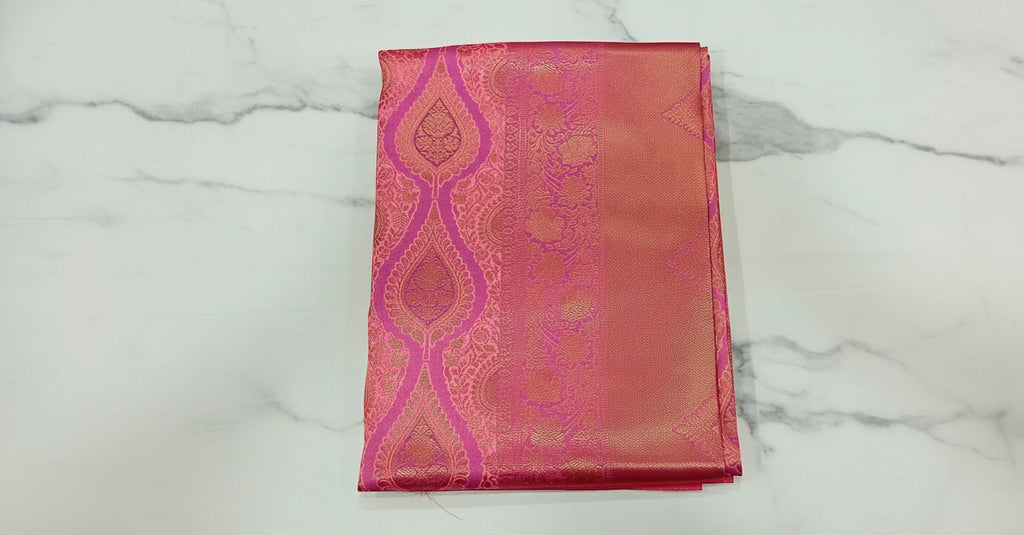Kanchipuram Pure Silk Saree with detailed Butta motifs and luxurious Pallu in Princess Pink color