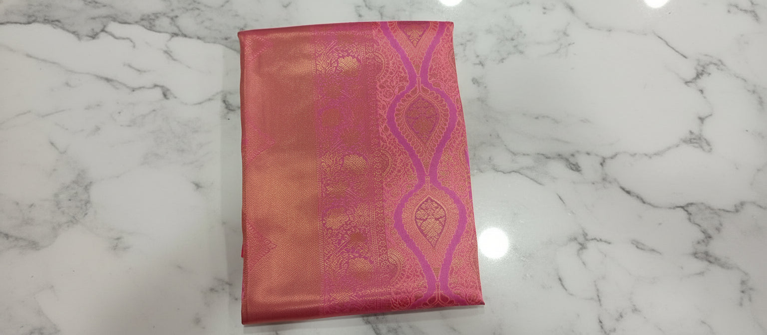 Kanchipuram Pure Silk Saree with detailed Butta motifs and luxurious Pallu in Princess Pink color