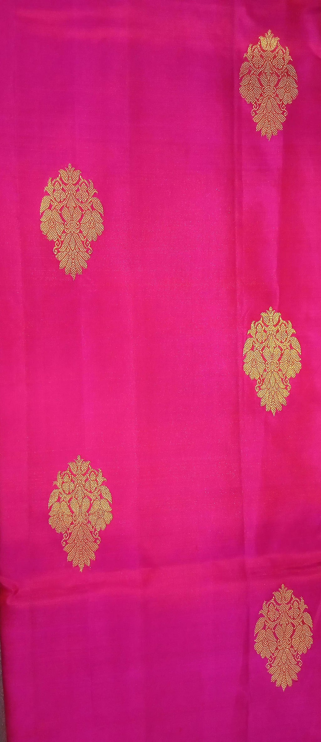 Kanchipuram Pure Silk Saree with bright gold Zari Motifs in Royal Pink color and Contrast Royal Blue Border
