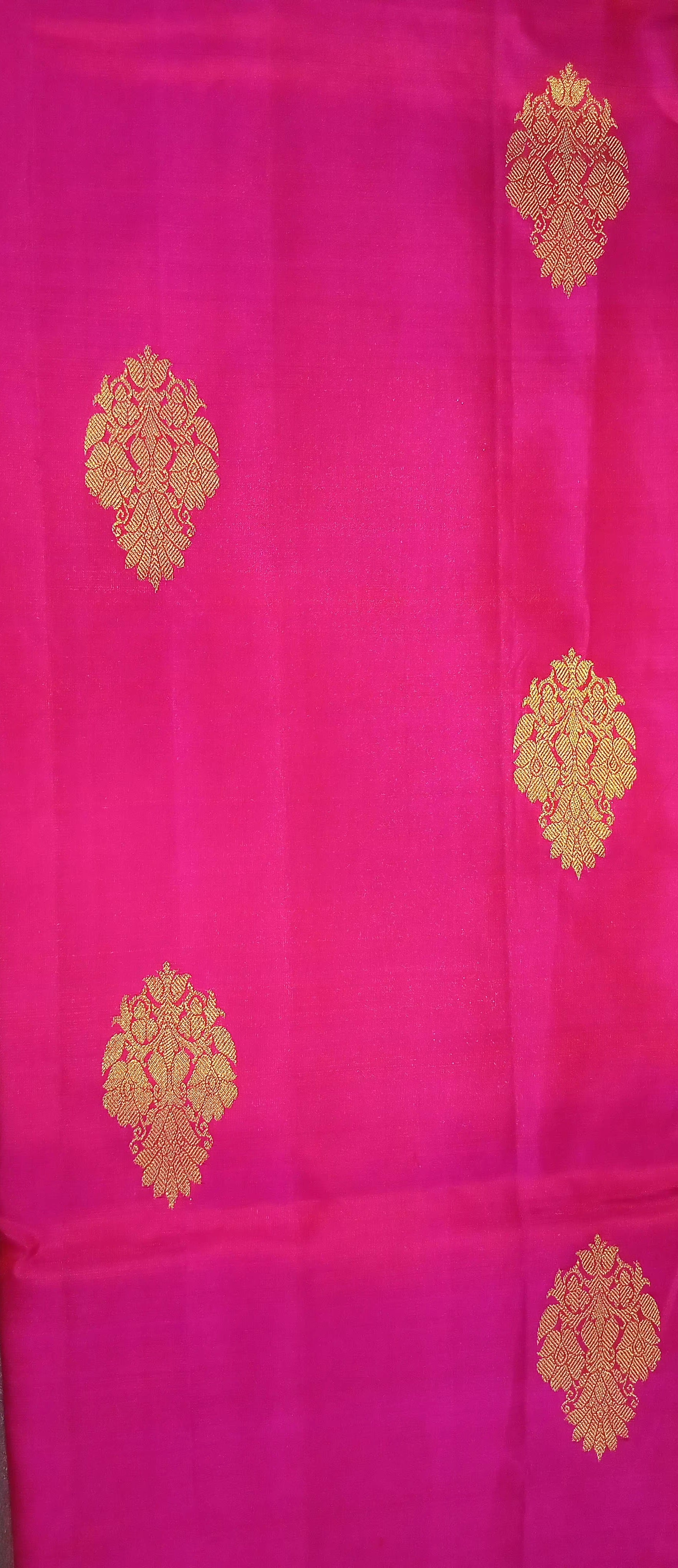 Kanchipuram Pure Silk Saree with bright gold Zari Motifs in Royal Pink color and Contrast Royal Blue Border