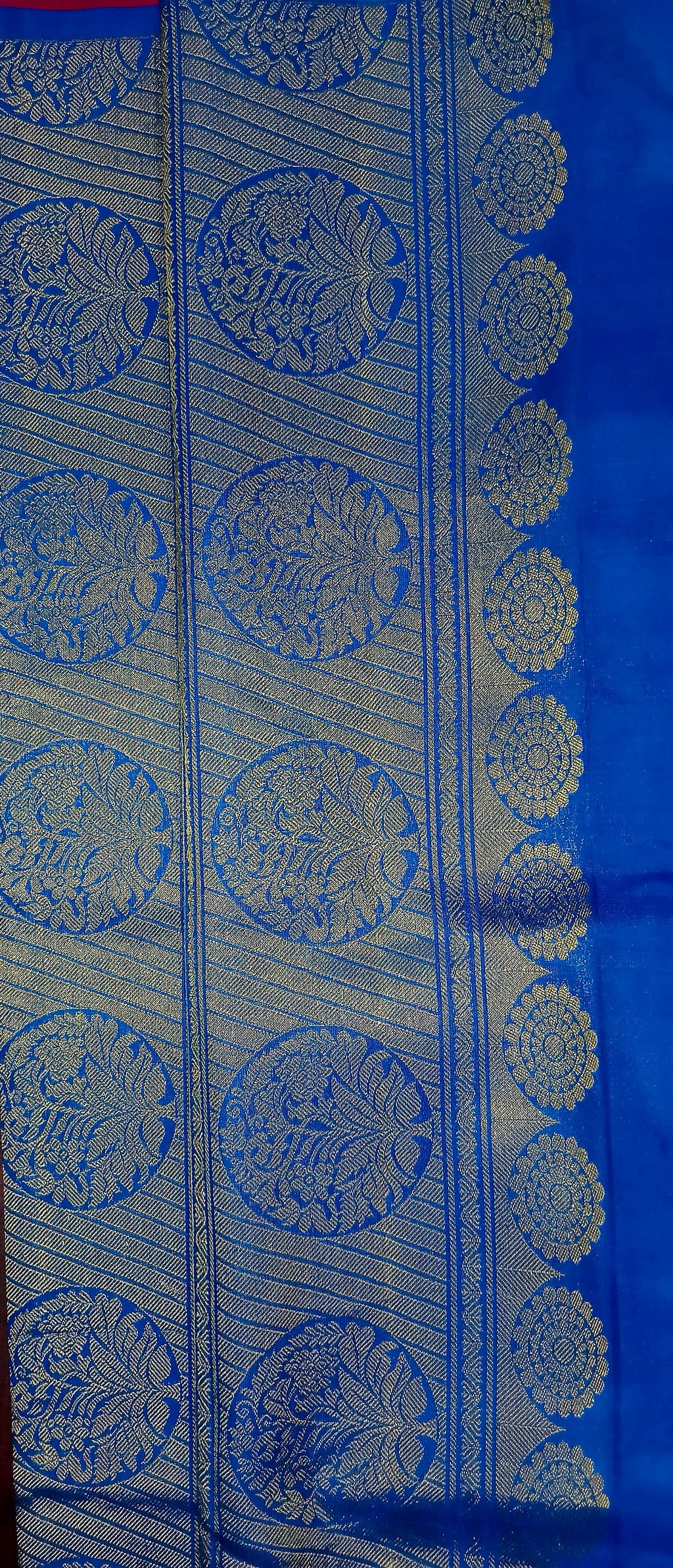 Kanchipuram Pure Silk Saree with bright gold Zari Motifs in Royal Pink color and Contrast Royal Blue Border