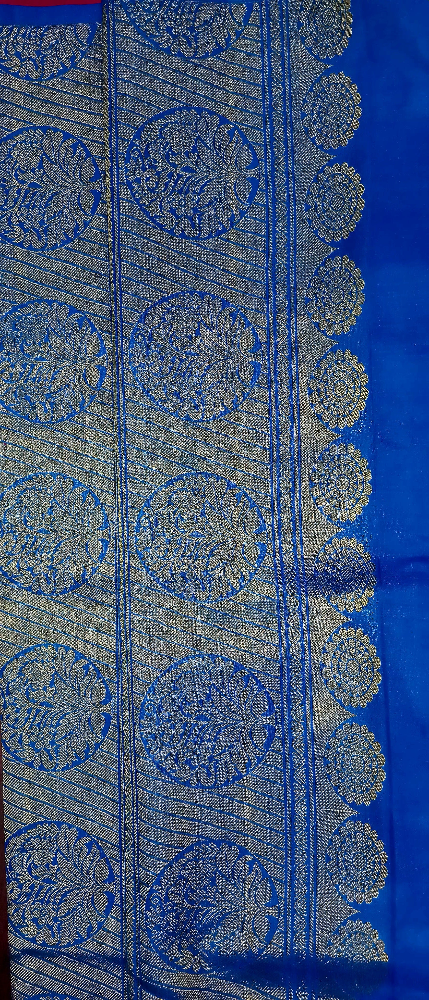 Kanchipuram Pure Silk Saree with bright gold Zari Motifs in Royal Pink color and Contrast Royal Blue Border