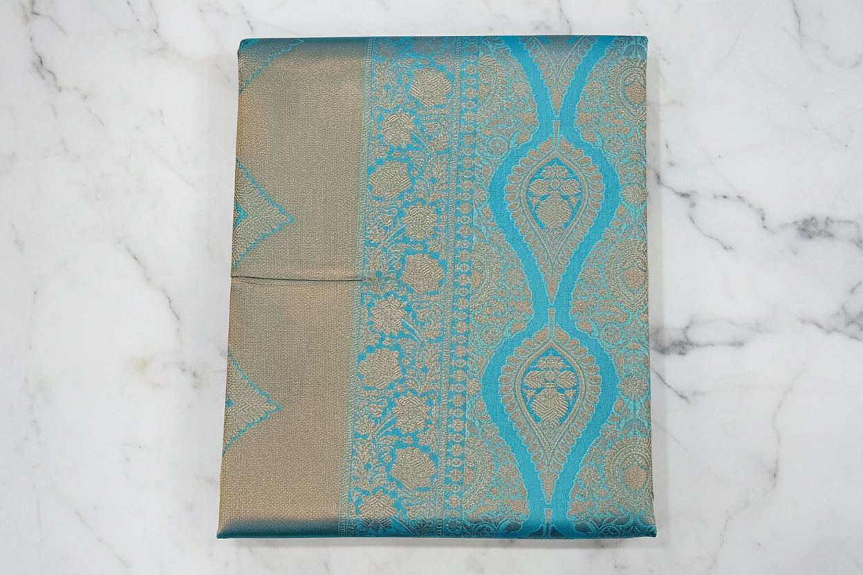 Kanchipuram Pure Silk Saree with detailed Butta motifs and luxurious Pallu in Sky Blue color