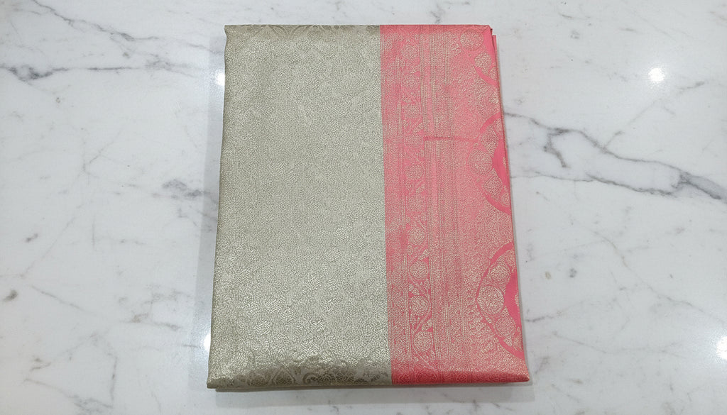 Kanchipuram Pure Silk Saree with detailed Butta motifs and luxurious Pallu in Cream Peach color