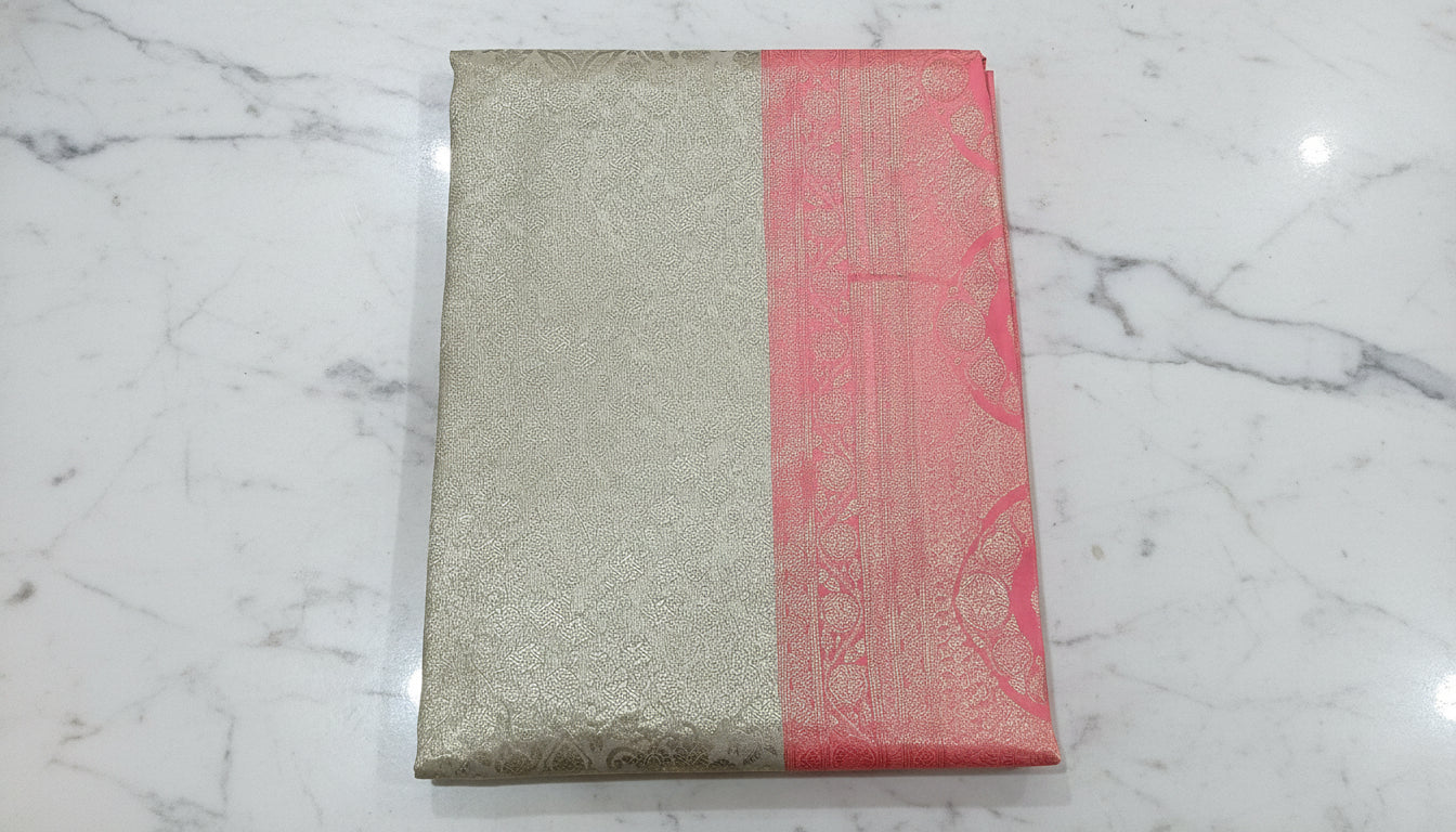 Kanchipuram Pure Silk Saree with detailed Butta motifs and luxurious Pallu in Cream Peach color