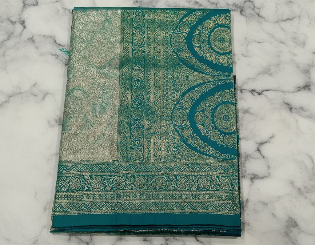 Kanchipuram Pure Silk Saree with detailed Butta motifs and luxurious Pallu in Two Tone Green color