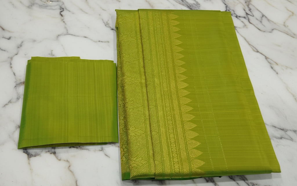 Kanchipuram Pure Silk Saree with bright gold Zari Motifs in Fresh Green leaf Color