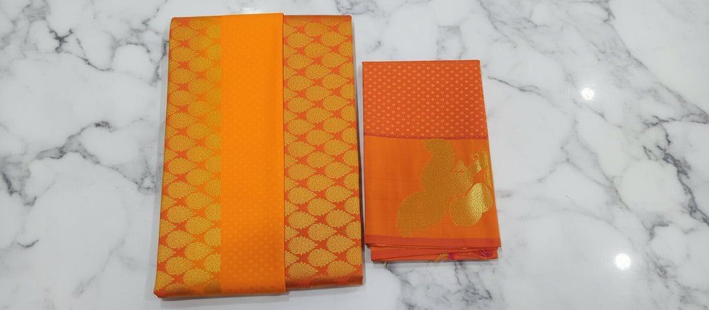 Kanchipuram Pure Silk saree with Intricate Gold Butta Motifs in Marigold Yellow Orange Color