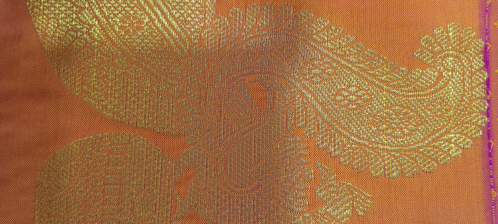 Kanchipuram Pure Silk saree with Intricate Gold Butta Motifs in Marigold Yellow Orange Color
