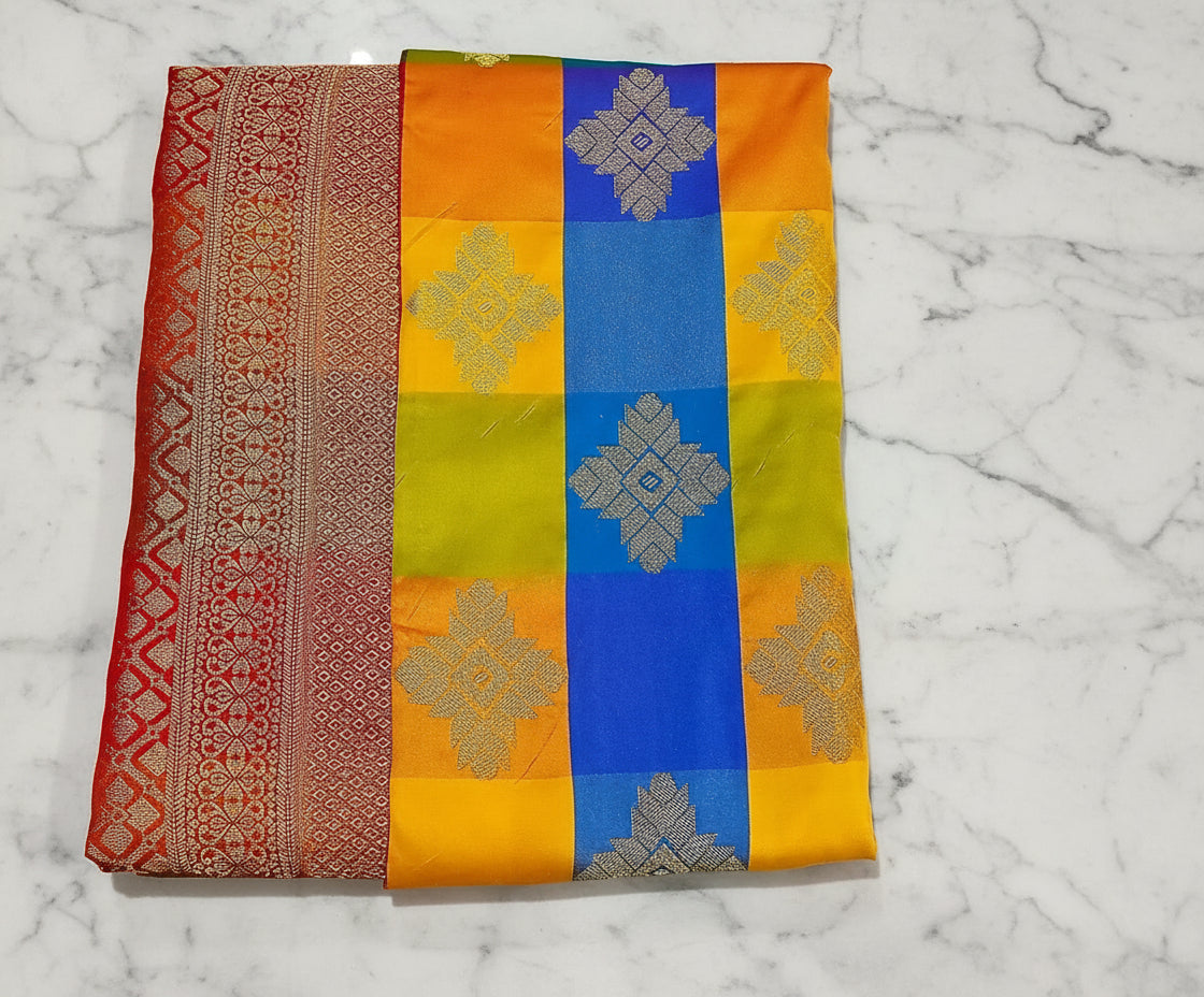 Kanchipuram Pure Silk Saree with Checkered Leaf Butta motifs and luxurious Pallu in Multi Yellow Orange color