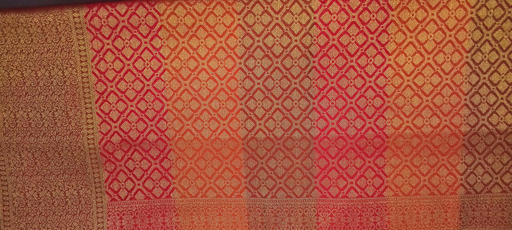 Kanchipuram Pure Silk Saree with Checkered Leaf Butta motifs and luxurious Pallu in Multi Yellow Orange color