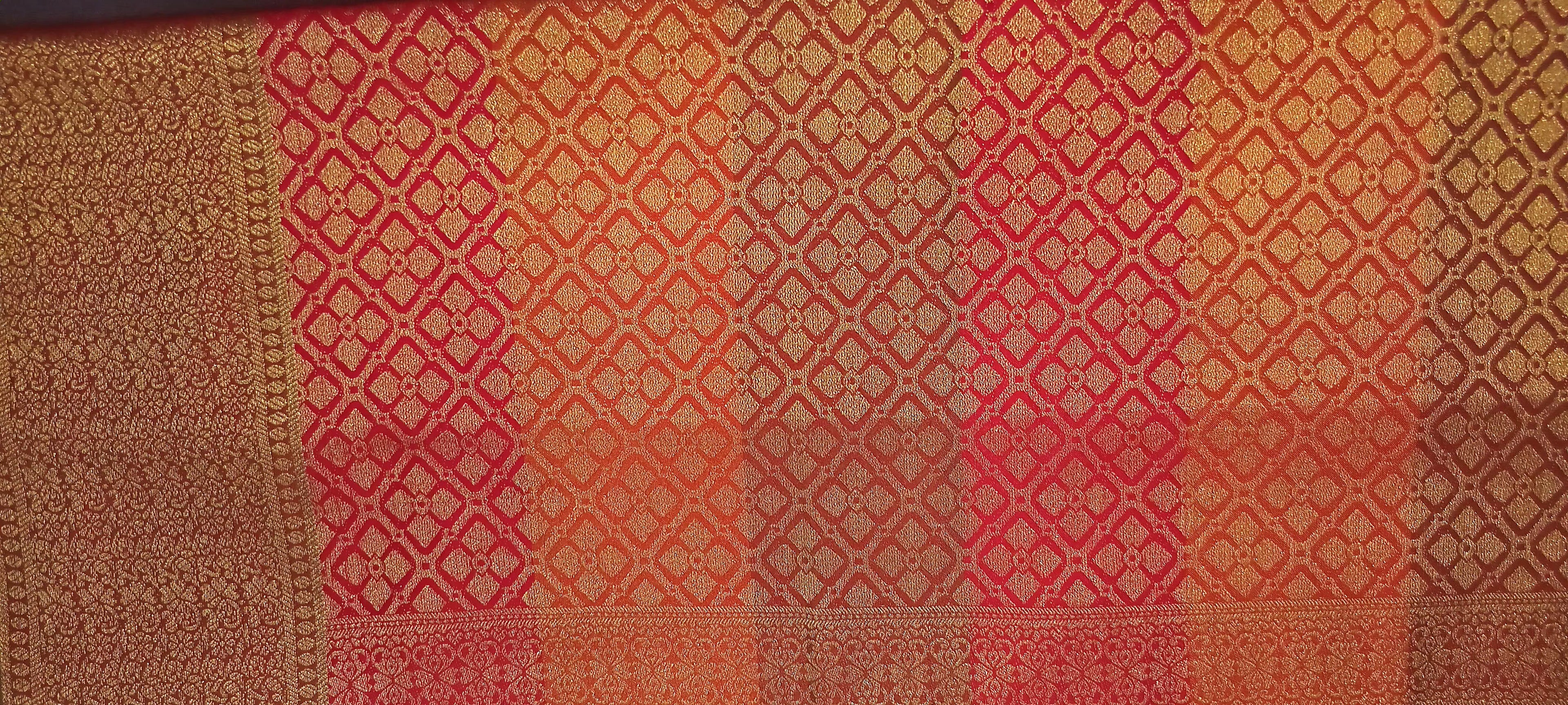 Kanchipuram Pure Silk Saree with Checkered Leaf Butta motifs and luxurious Pallu in Multi Yellow Orange color