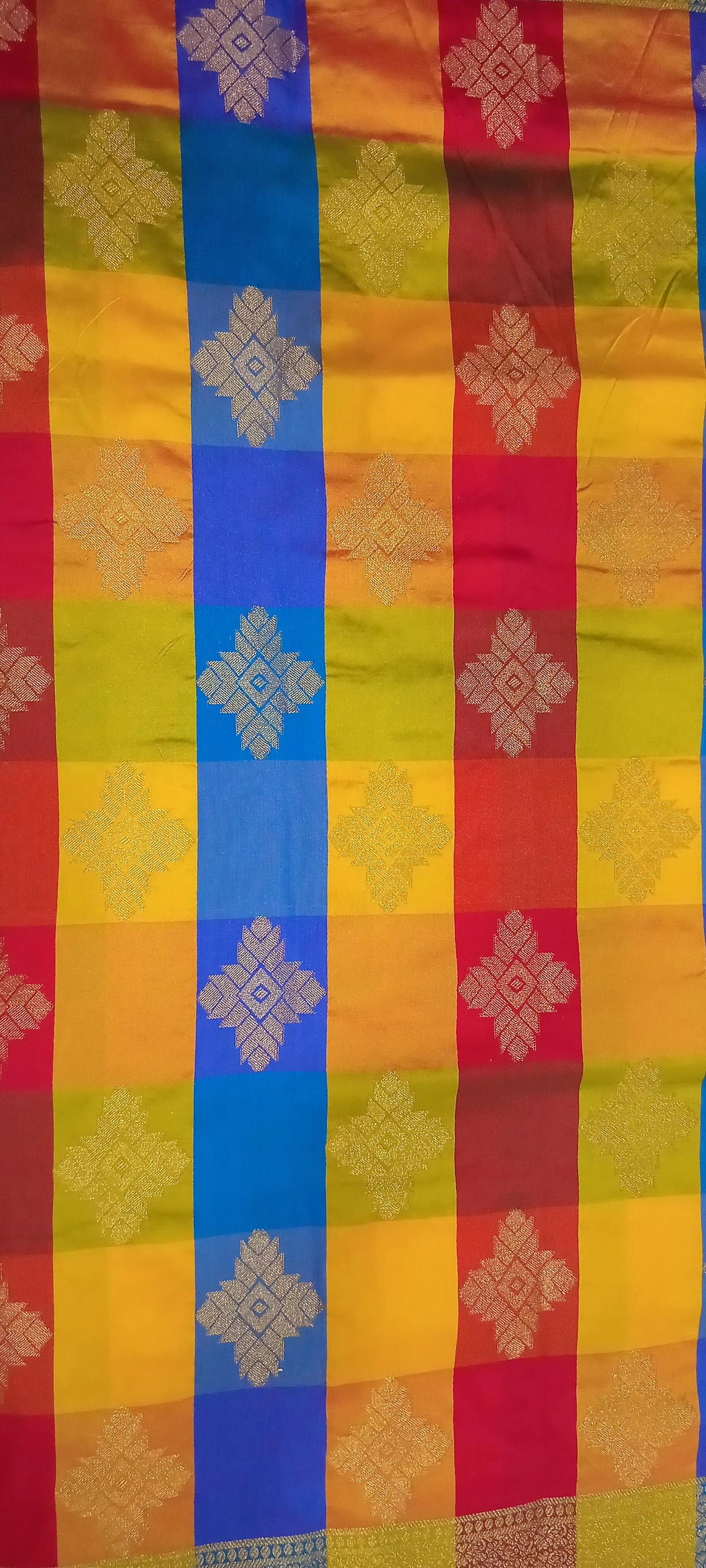 Kanchipuram Pure Silk Saree with Checkered Leaf Butta motifs and luxurious Pallu in Multi Yellow Orange color