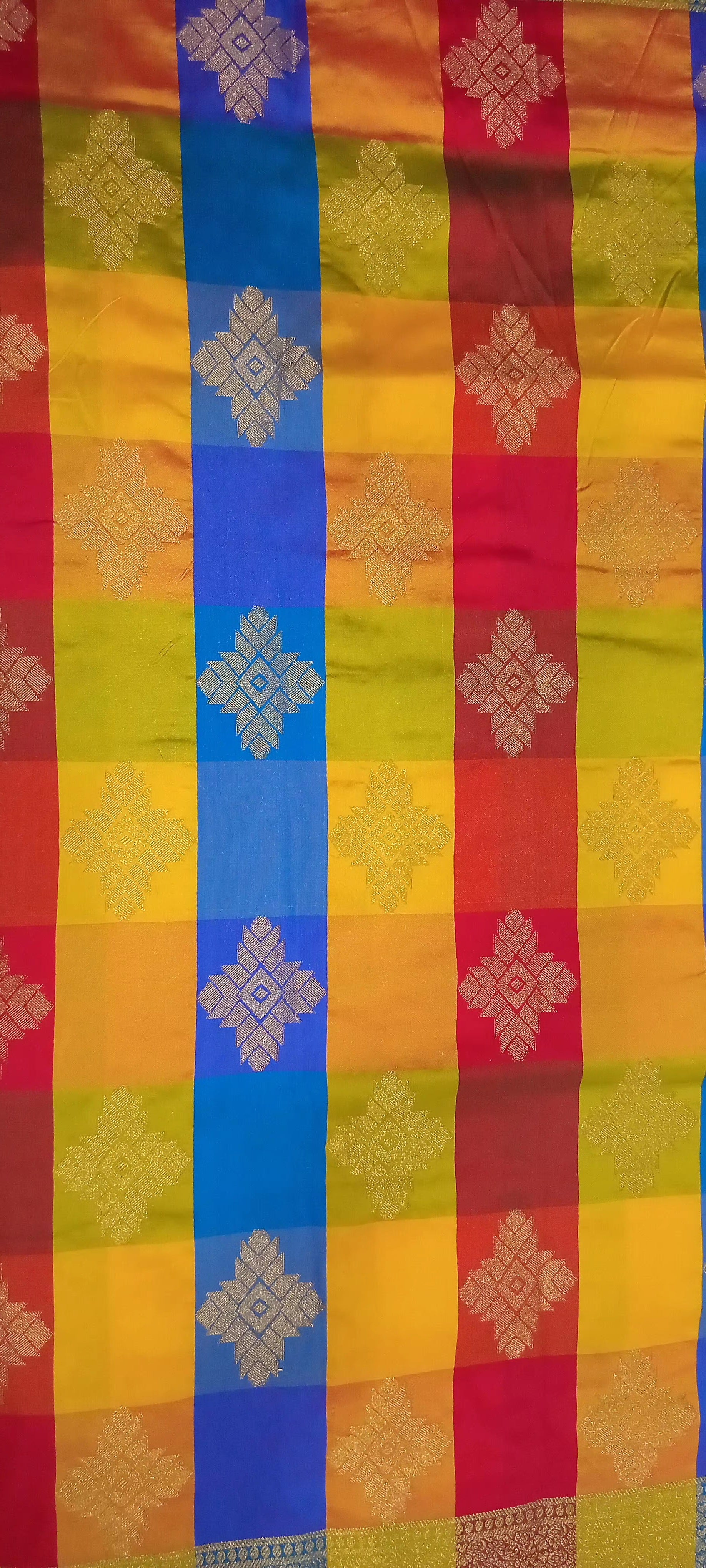 Kanchipuram Pure Silk Saree with Checkered Leaf Butta motifs and luxurious Pallu in Multi Yellow Orange color