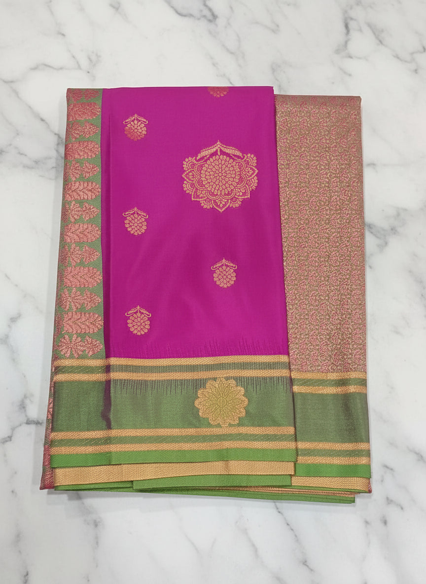 Kanchipuram Pure Silk Saree with Floral Butta in two tone Zari in Purple color with contrast border