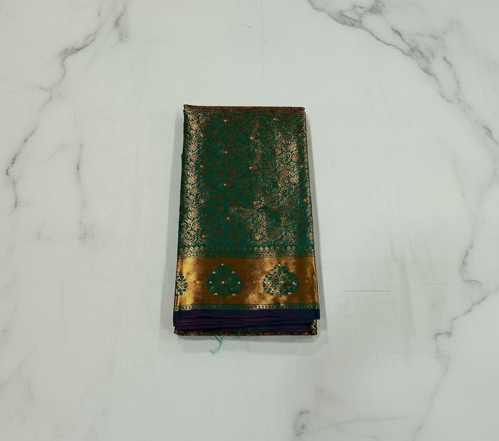 Kanchipuram Pure Silk Saree with detailed Gold Zari Butta motifs and luxurious Pallu with stick on Minakari in Bluish Green color