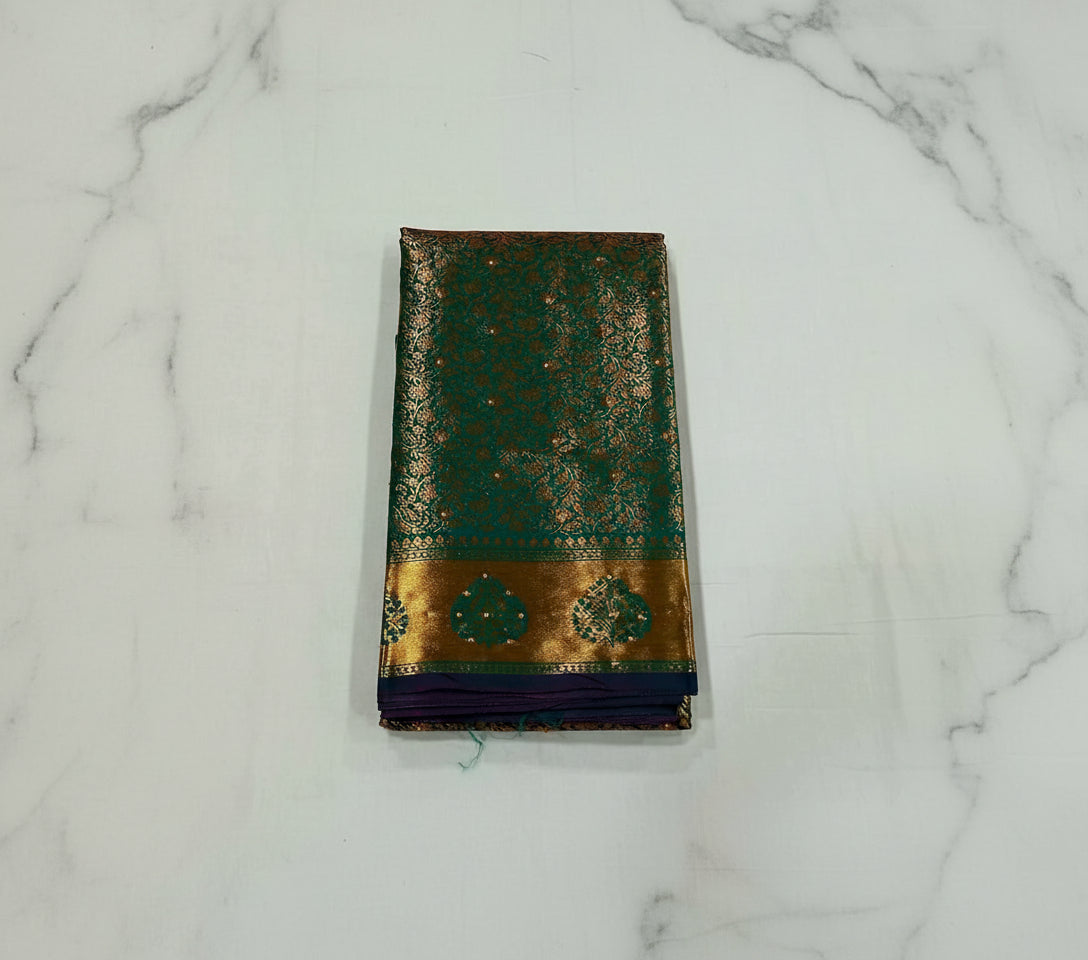 Kanchipuram Pure Silk Saree with detailed Gold Zari Butta motifs and luxurious Pallu with stick on Minakari in Bluish Green color