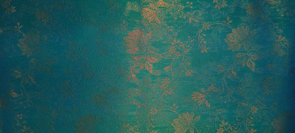 Kanchipuram Pure Silk Saree with detailed Butta motifs and luxurious Pallu in Aqua Blue color