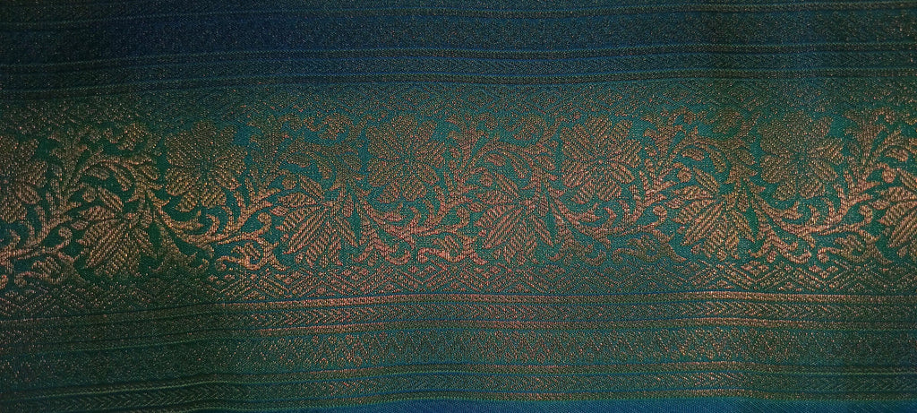 Kanchipuram Pure Silk Saree with detailed Butta motifs and luxurious Pallu in Aqua Blue color