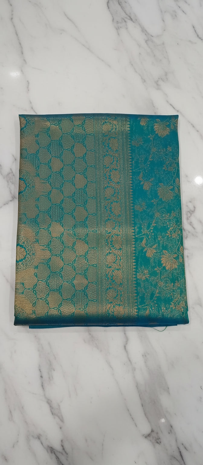 Kanchipuram Pure Silk Saree with detailed Butta motifs and luxurious Pallu in Aqua Blue color