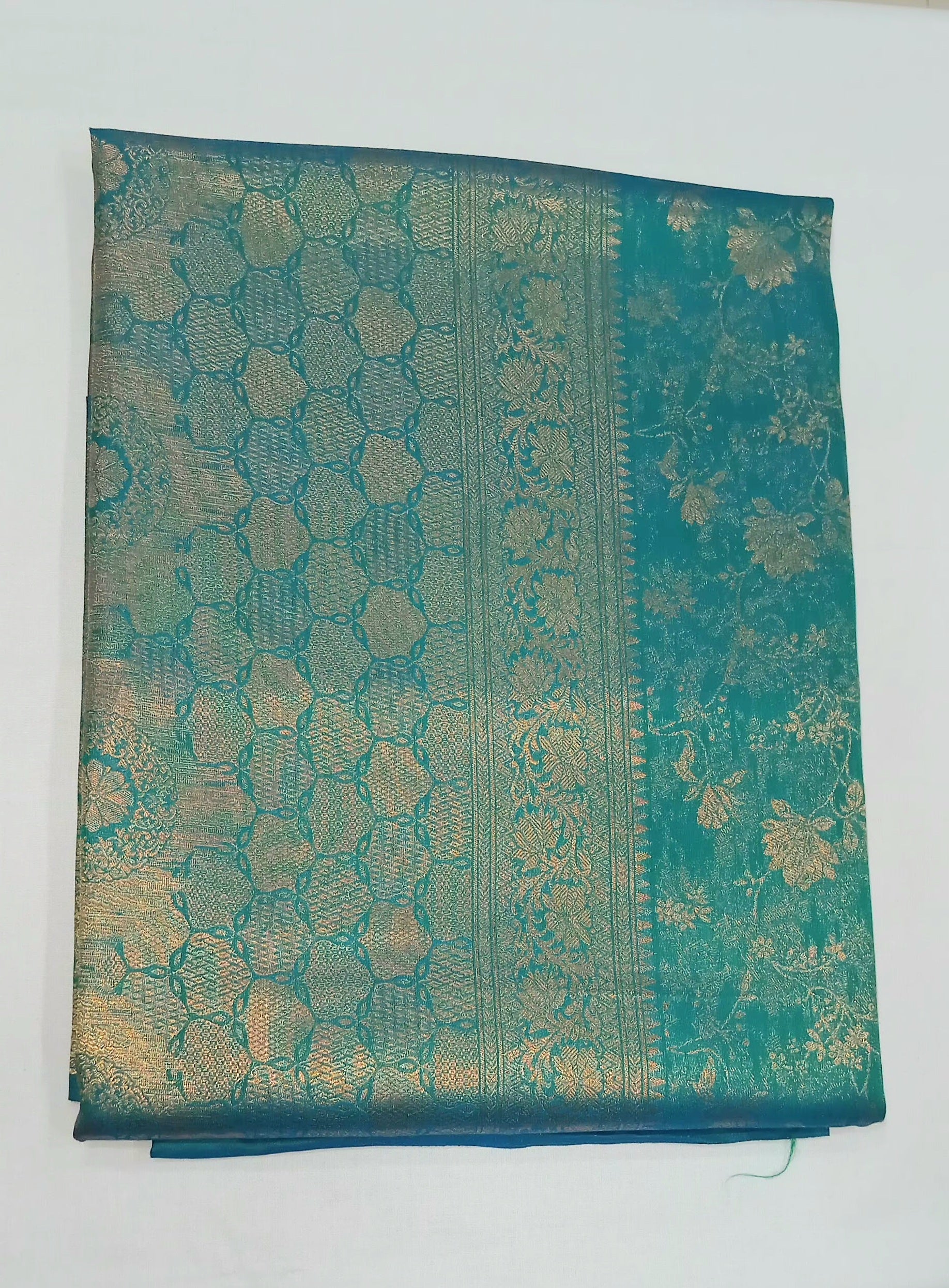 Kanchipuram Pure Silk Saree with detailed Butta motifs and luxurious Pallu in Aqua Blue color