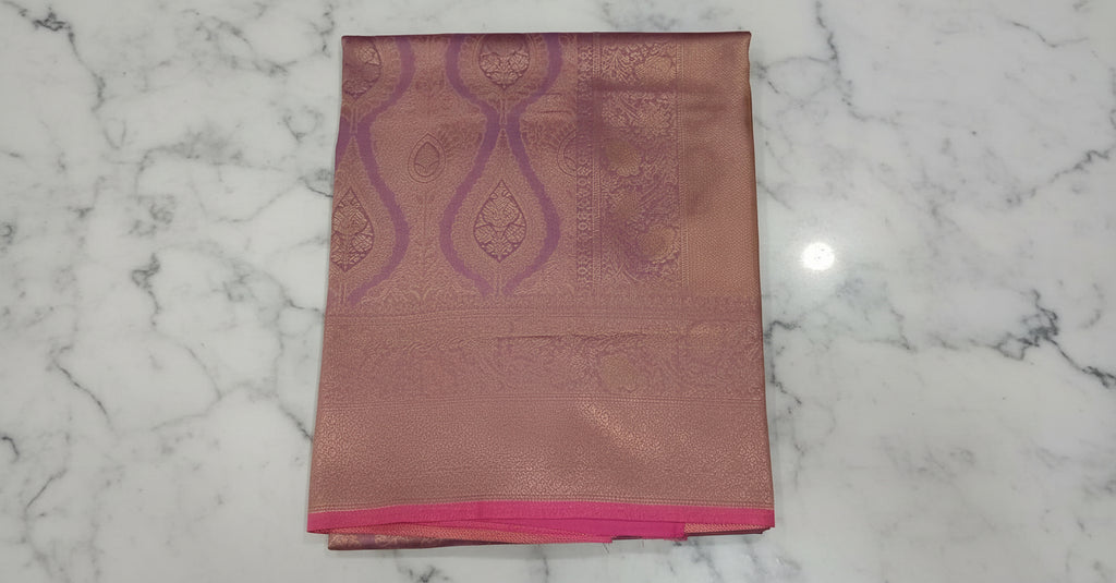 Kanchipuram Pure Silk Saree with detailed Butta motifs and luxurious Pallu in Lilac Purple color