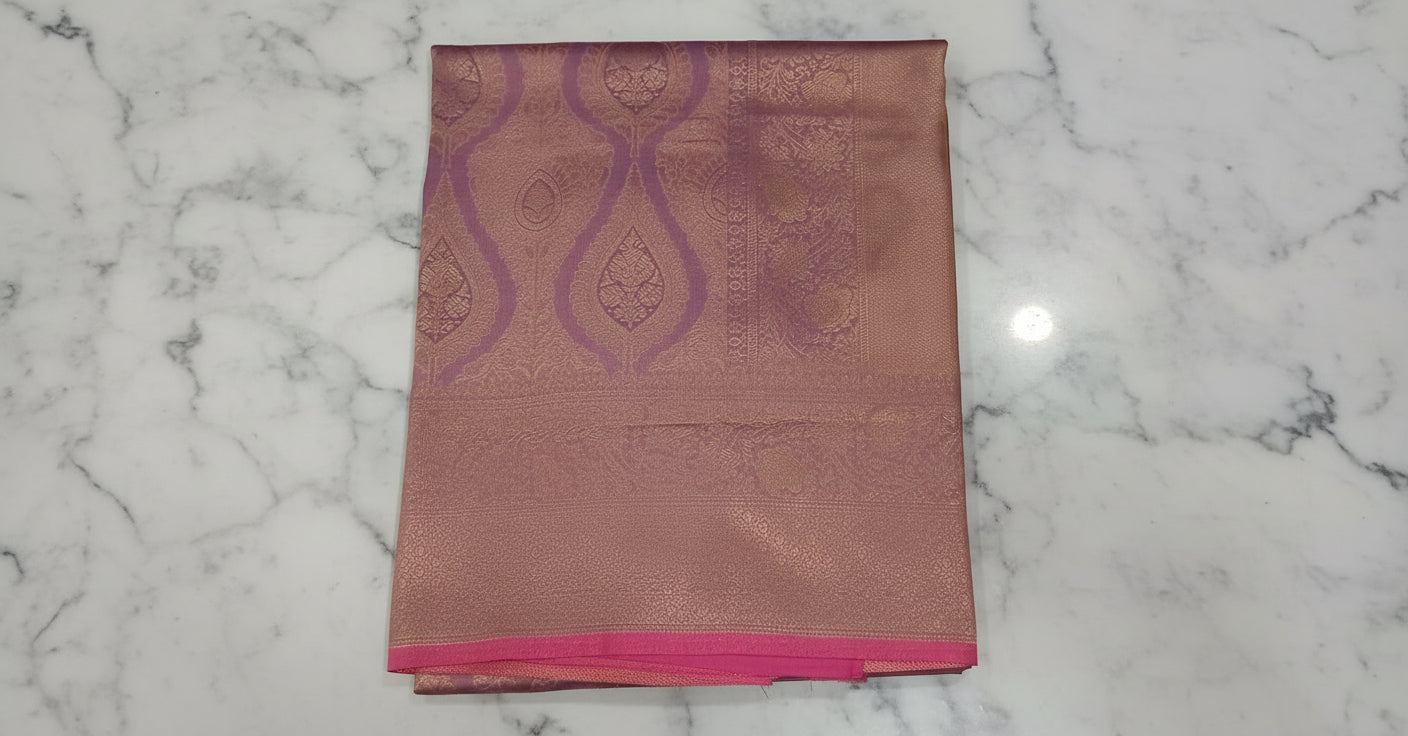 Kanchipuram Pure Silk Saree with detailed Butta motifs and luxurious Pallu in Lilac Purple color