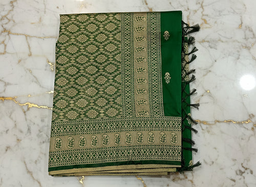 Banarasi Pure Silk Saree with mini gold zari butta motif all over saree with elaborate gold zari border and pallu in Deep Green color