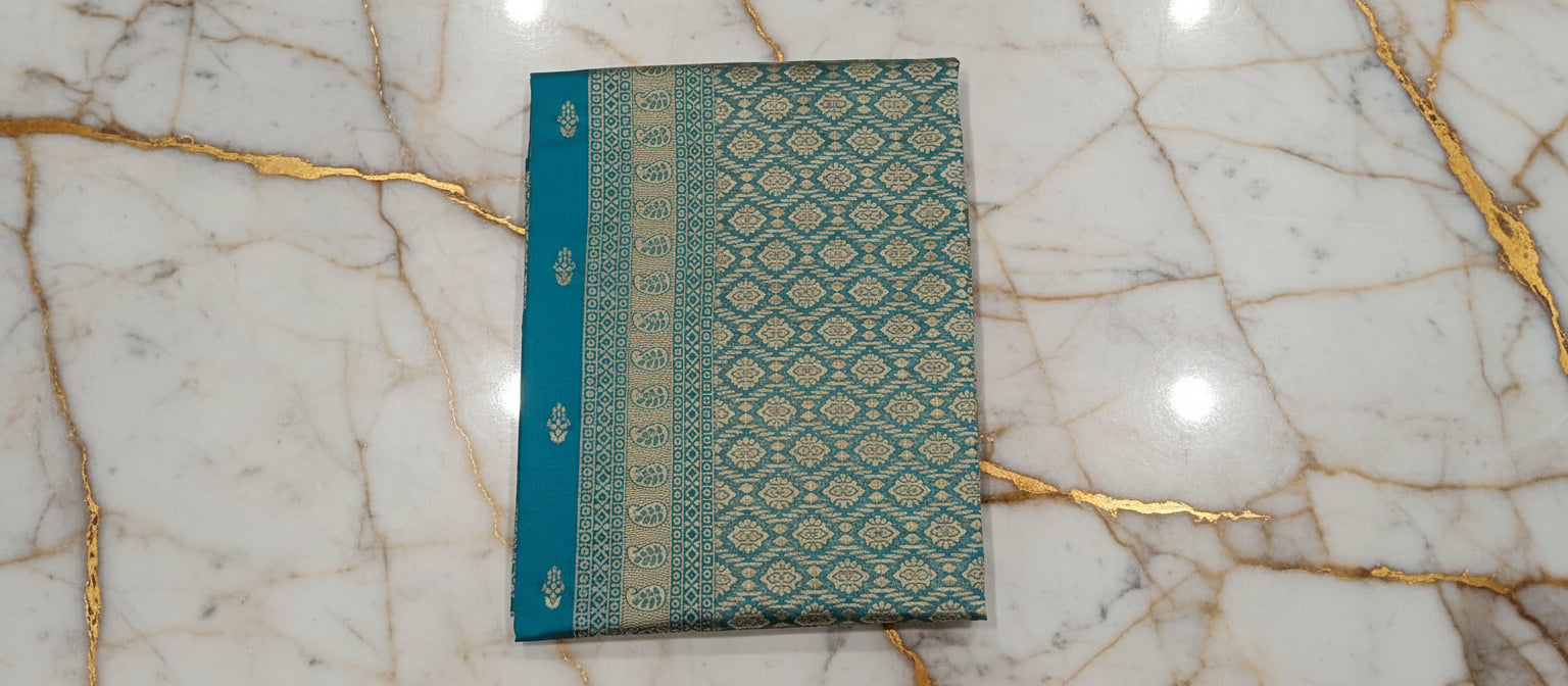 Banarasi Pure Silk Saree with mini gold zari butta motif all over saree with elaborate gold zari border and pallu in Greenish Blue color