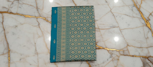 Banarasi Pure Silk Saree with mini gold zari butta motif all over saree with elaborate gold zari border and pallu in Greenish Blue color