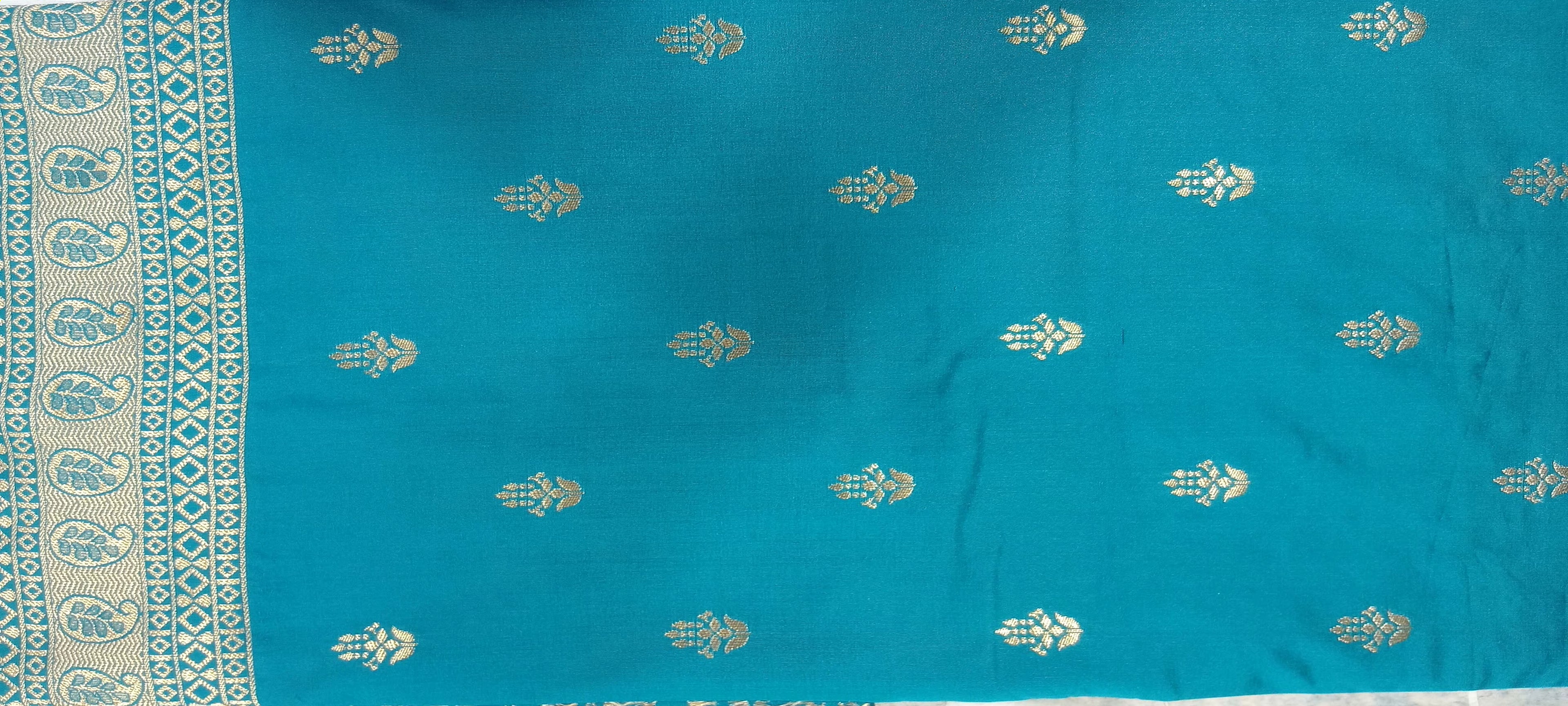Banarasi Pure Silk Saree with mini gold zari butta motif all over saree with elaborate gold zari border and pallu in Greenish Blue color