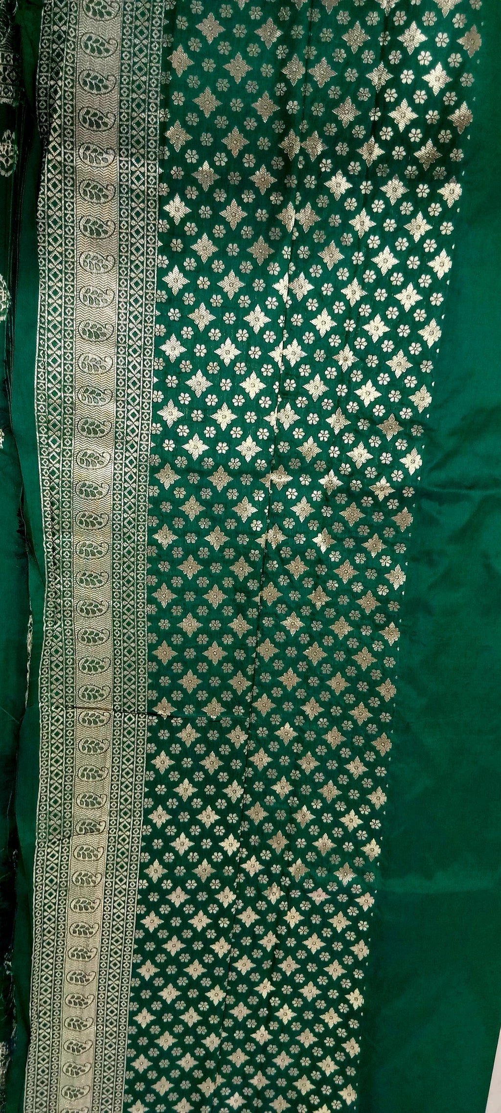 Banarasi Pure Silk Saree with mini gold zari butta motif all over saree with elaborate gold zari border and pallu in Deep Green color