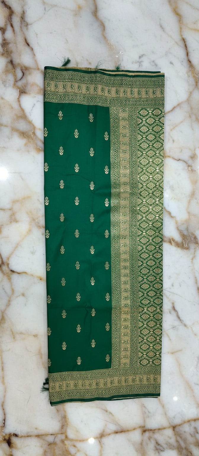 Banarasi Pure Silk Saree with mini gold zari butta motif all over saree with elaborate gold zari border and pallu in Deep Green color