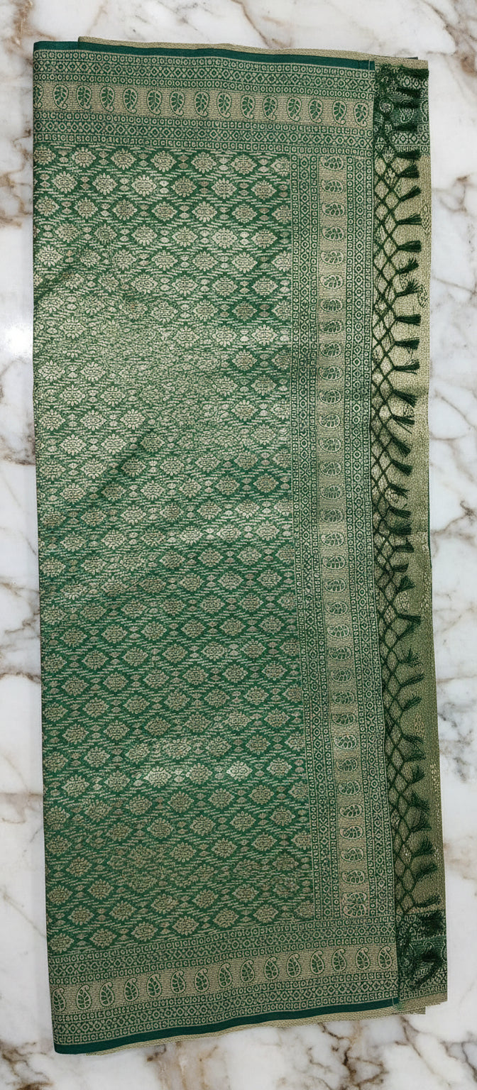 Banarasi Pure Silk Saree with mini gold zari butta motif all over saree with elaborate gold zari border and pallu in Deep Green color