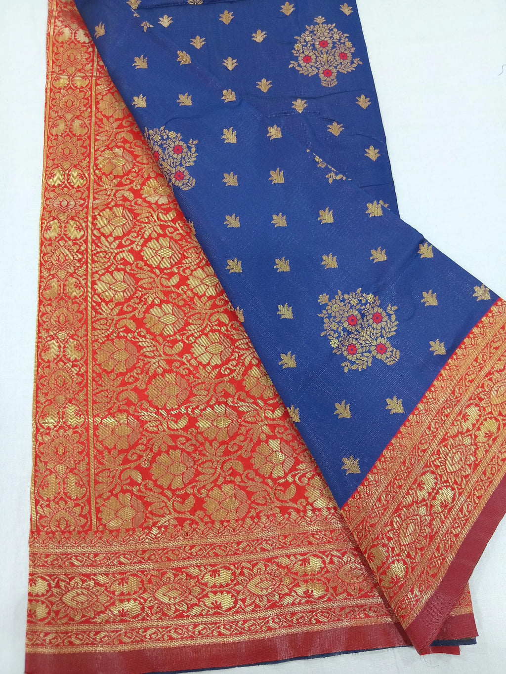 Semi Kanchipuram Silk Saree with Gold Zari Buttas and Pallu in Royal Blue Red color