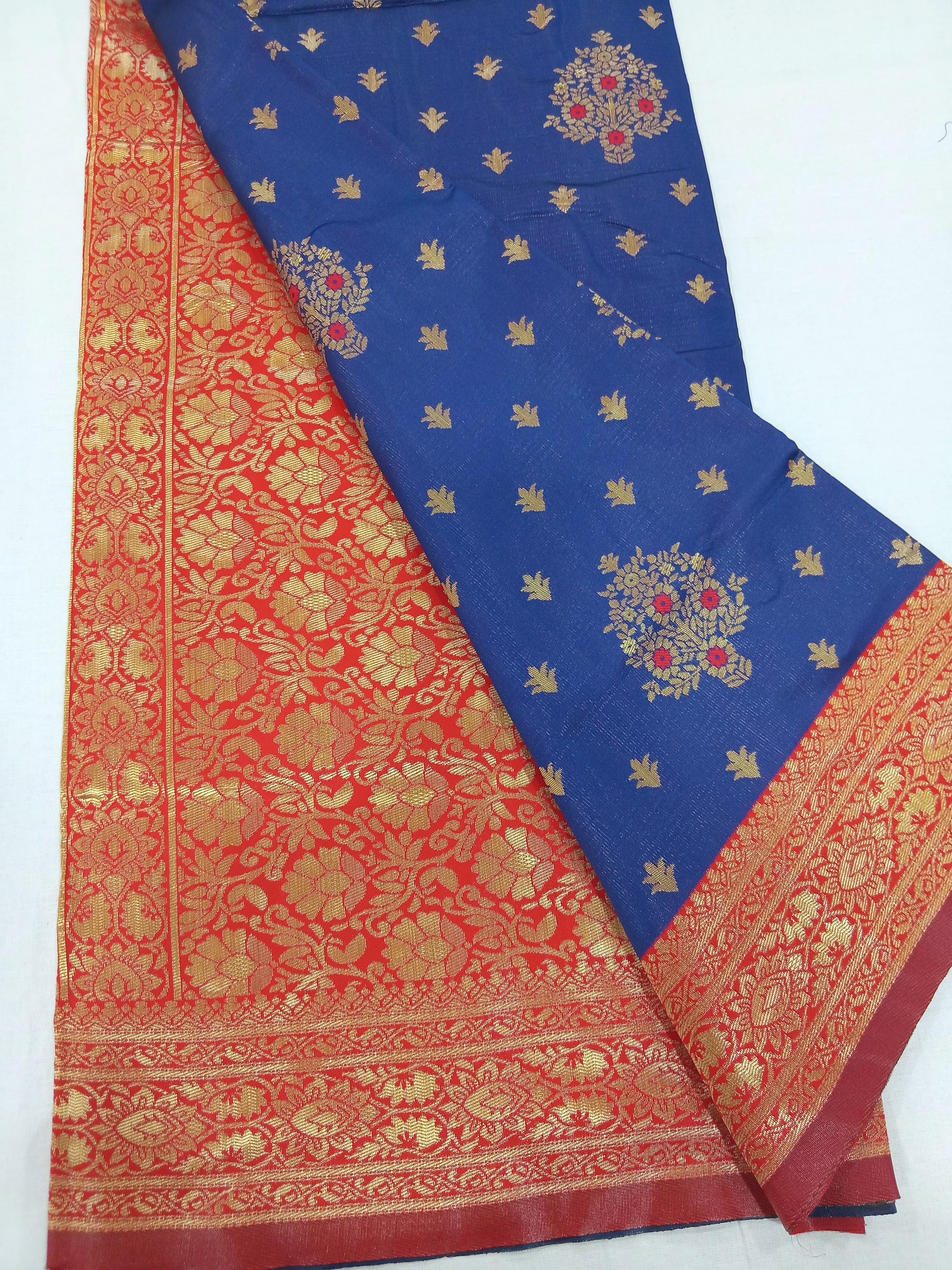 Semi Kanchipuram Silk Saree with Gold Zari Buttas and Pallu in Royal Blue Red color