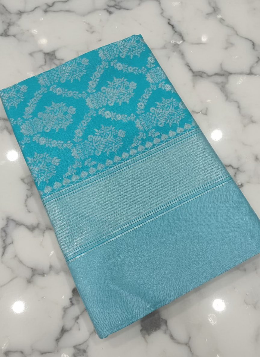 Semi Kanchipuram Silk Saree with Gold Zari Buttas and Pallu in Artic Blue Color